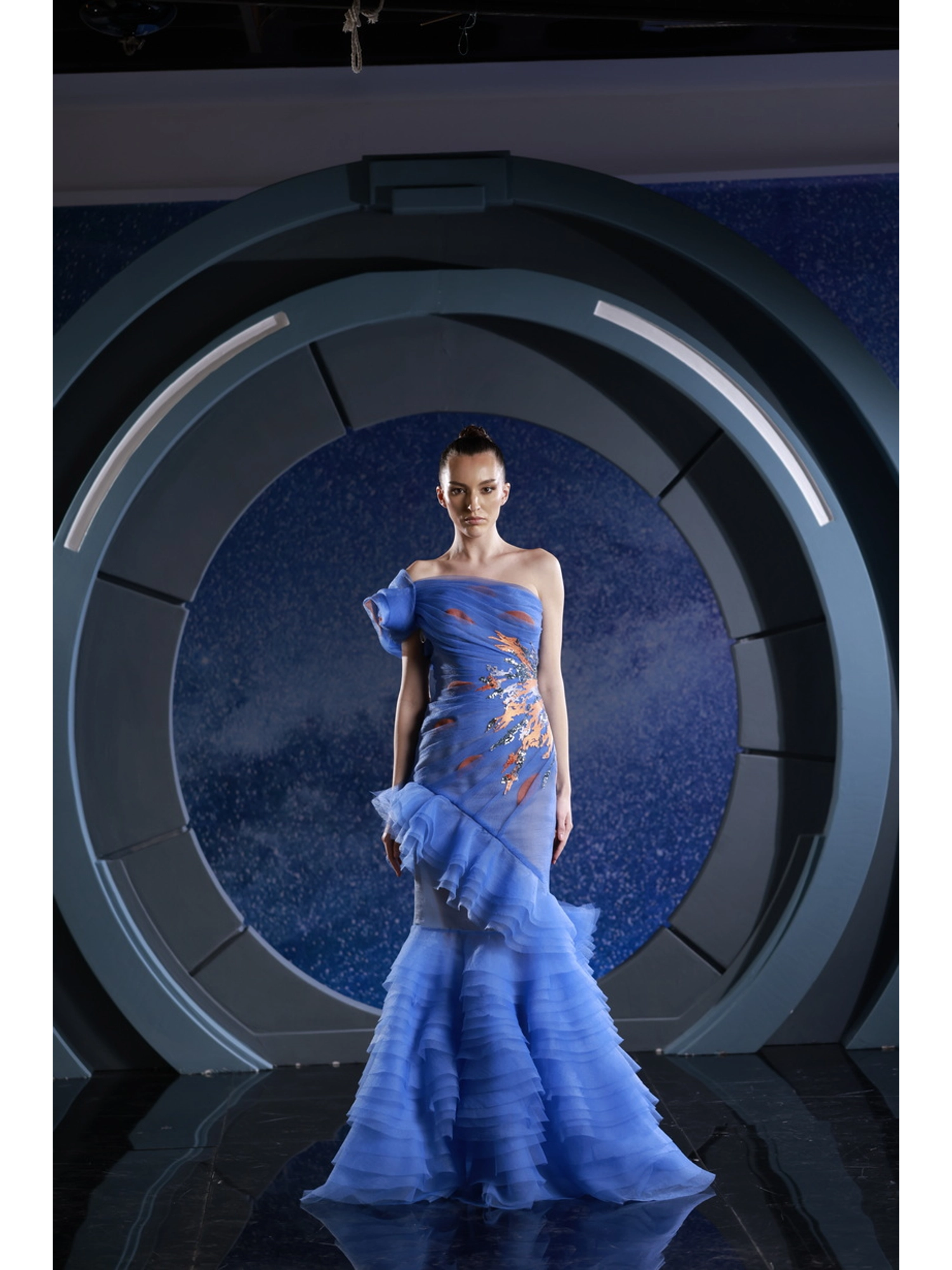 FW 136 - Draped organza dress with cascading ruffle skirt, graced  with a spiral organza at the shoulder.Blue US 01
